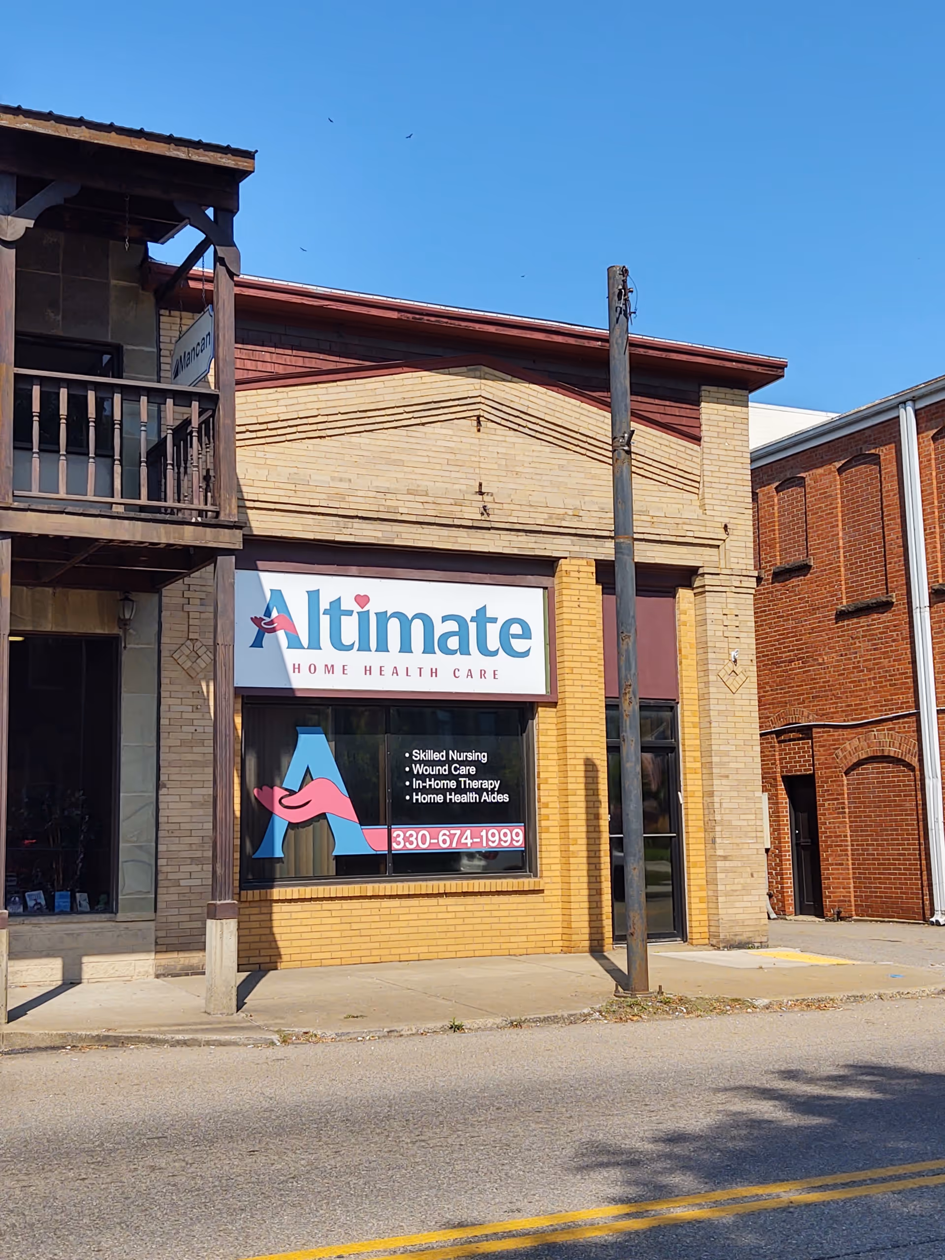 Exterior storefront of Altimate Home Health Care with brick facade and sign