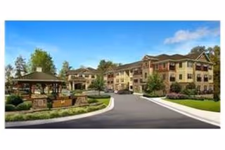 Exterior view of HearthSide Sugarloaf showing the driveway, landscaping, and building facade.