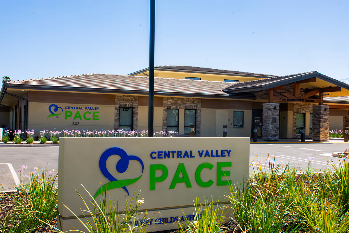 Exterior view of Central Valley PACE with a large front sign and landscaped frontage.