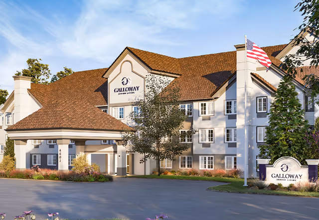 Front view of Galloway Senior Living building with flag and landscaping.