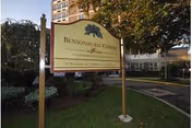 Front exterior view shows the Bensonhurst Center sign with a building and trees behind.