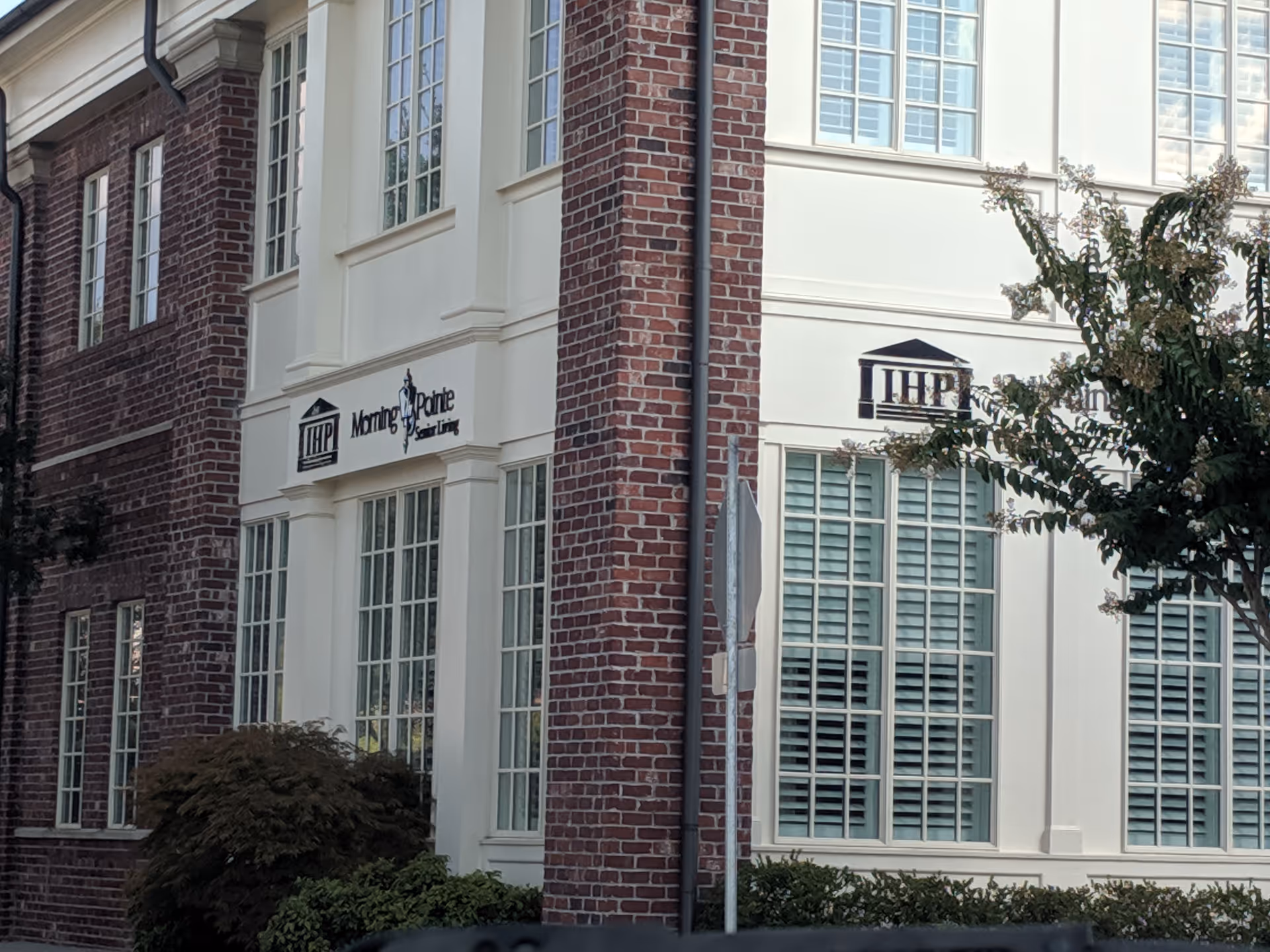 Exterior view of a brick senior living facility with Morning Pointe signage.