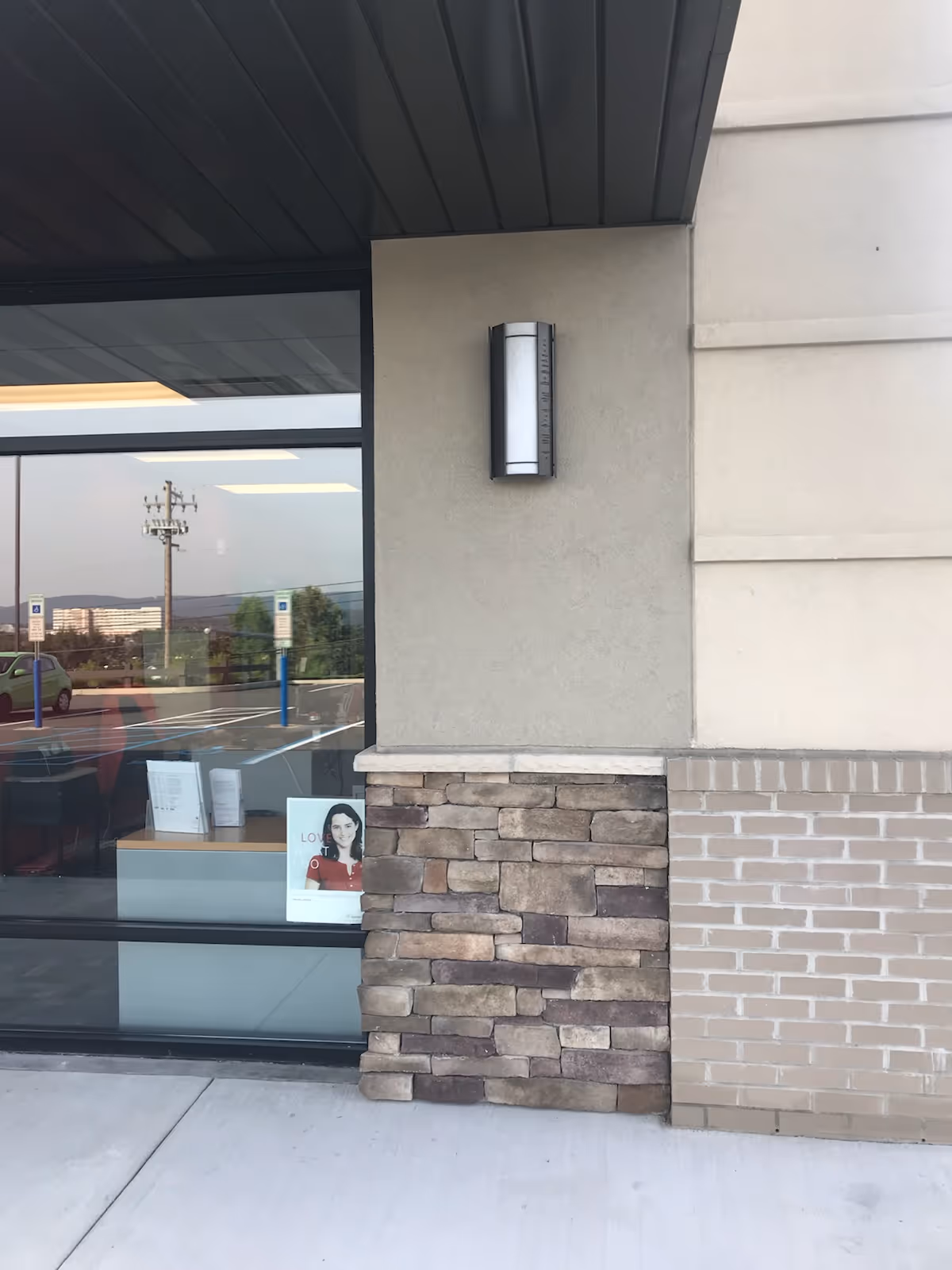 Exterior view of BAYADA Adult Assistive Care building with glass storefront.