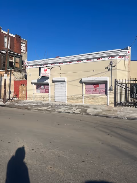 Street view of a beige building with Bountiful Love Home Health Care signage.