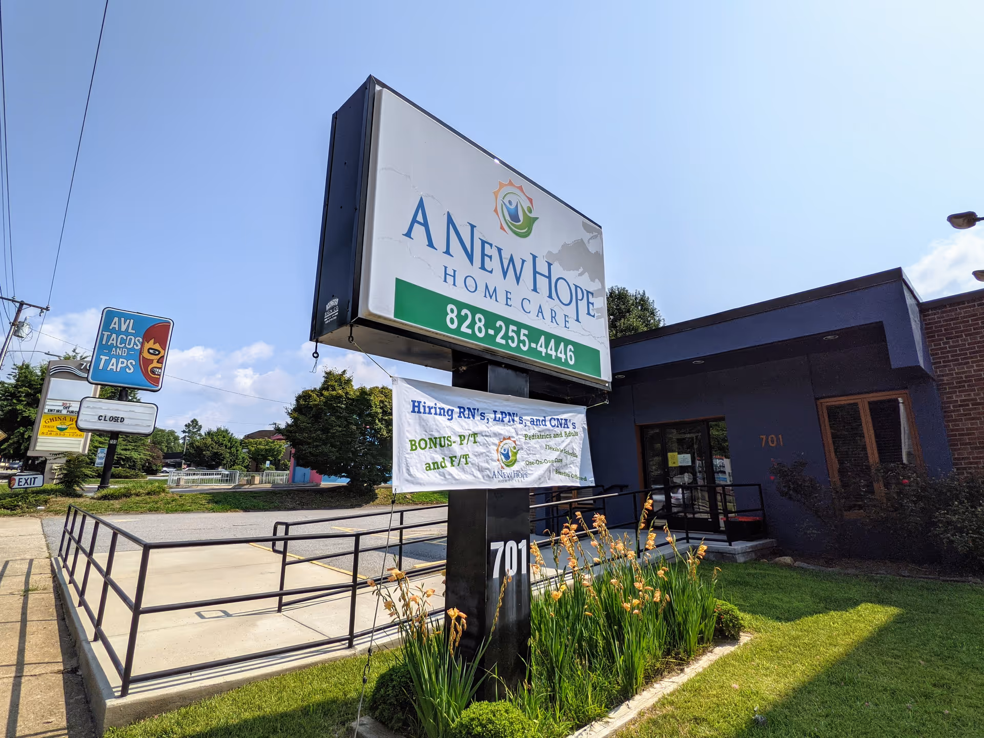 Exterior view of A New Hope Home Care building with large sign and entrance.