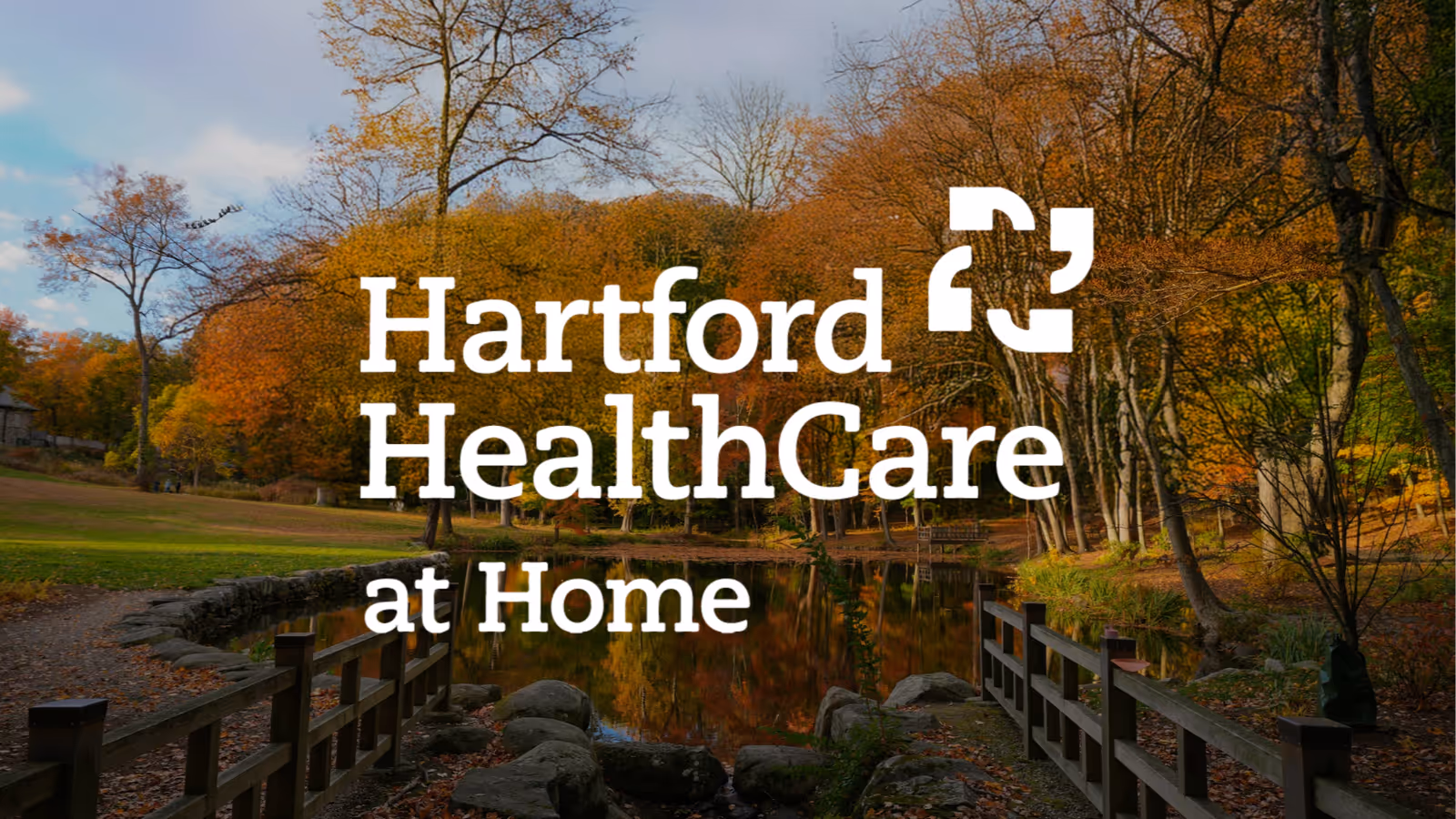 Autumn park scene with a pond, wooden bridge, and Hartford HealthCare at Home branding.