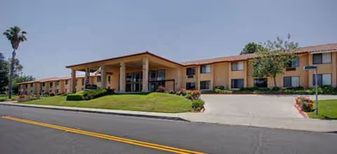 Single story Brookdale Loma Linda building with a covered entrance and manicured lawn.