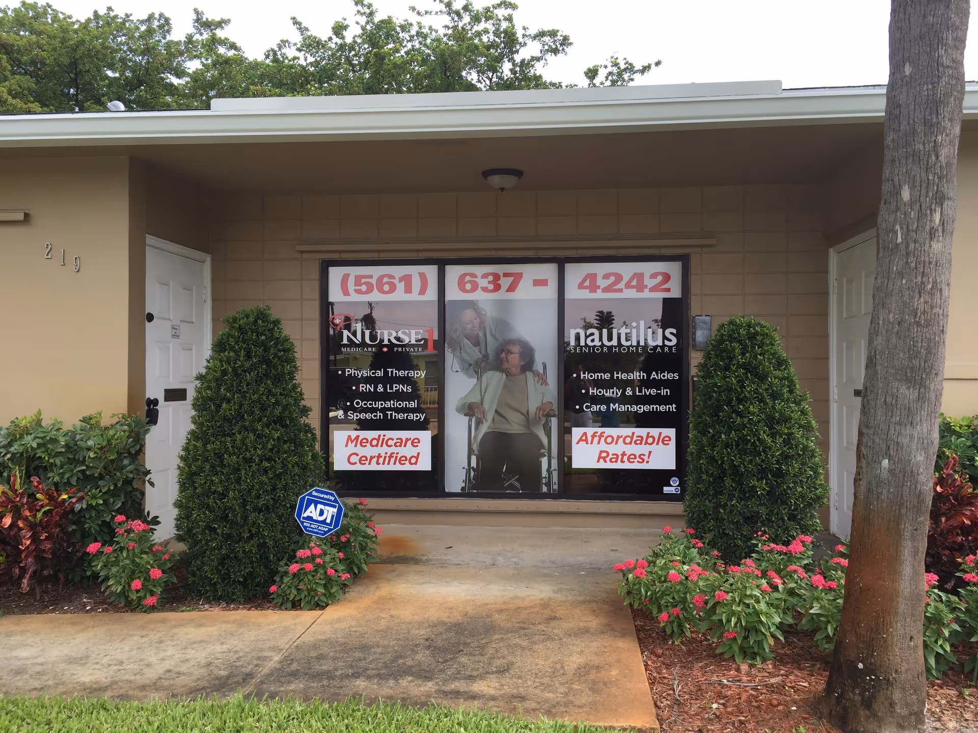 Front entrance of Nurse 1 Home Healthcare with window banners.