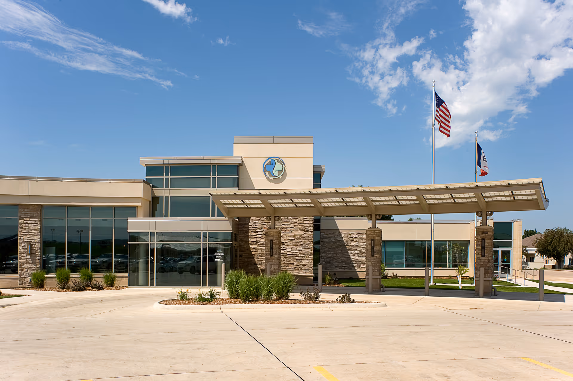 Exterior view of a modern Hegg Home Health Care building with a covered entrance