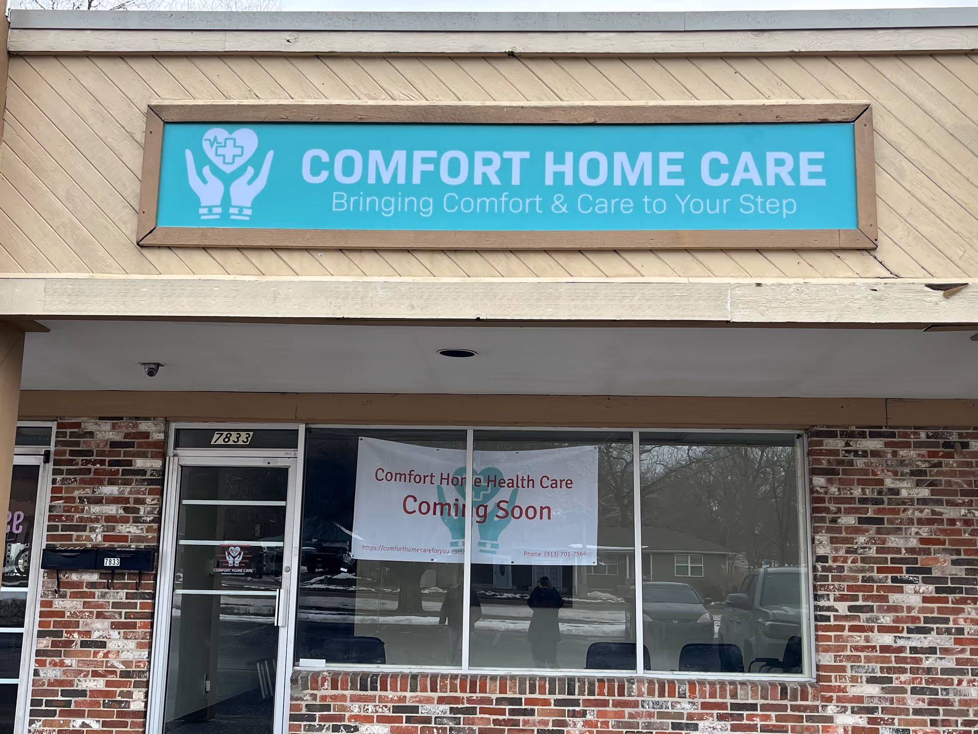 Exterior view of Comfort Home Care building with teal sign and Coming Soon banner