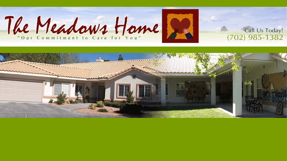 The Meadows Home exterior of a single-story senior living facility with entrance and greenery.