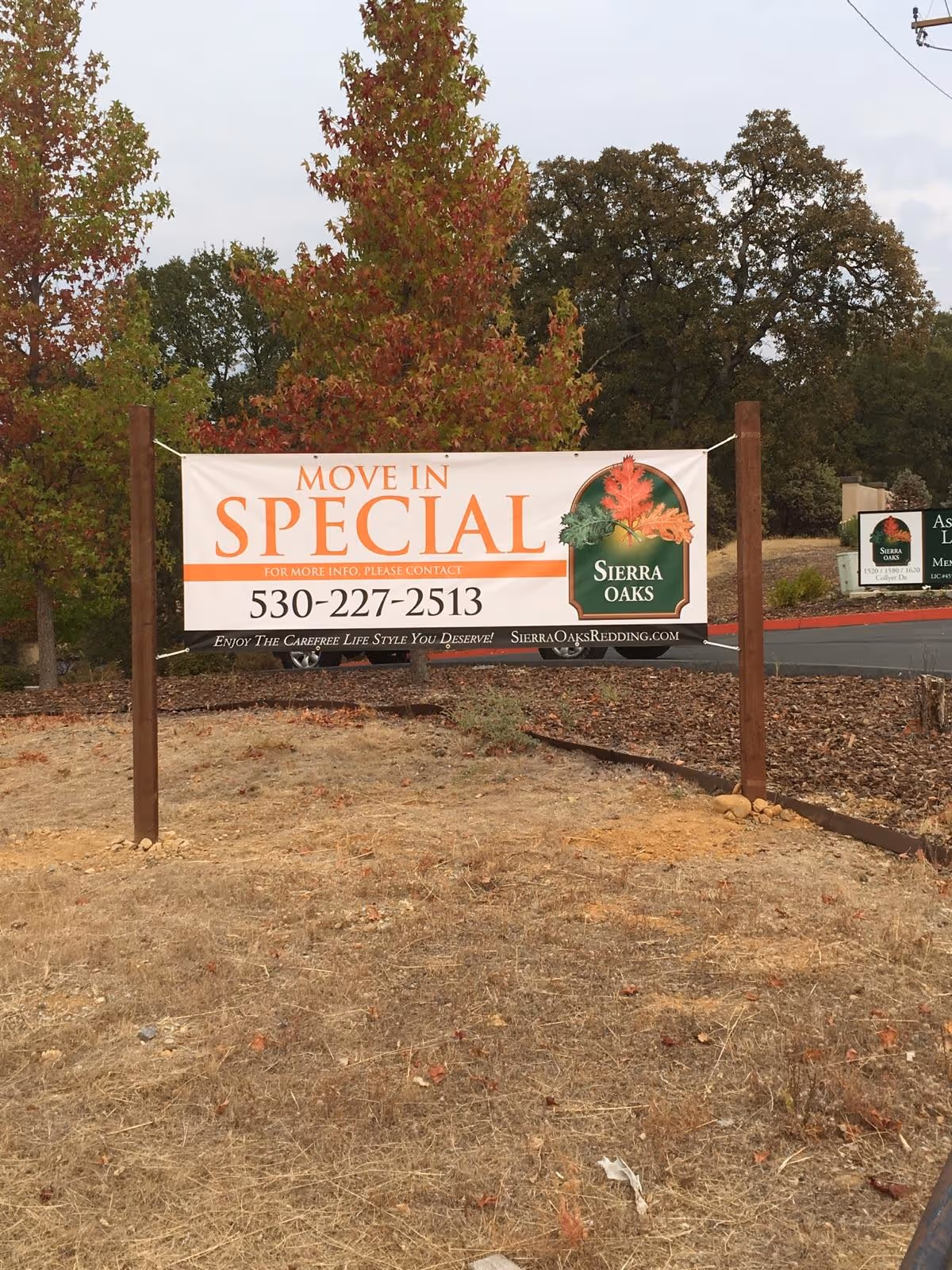 Outdoor sign advertising move-in special for Sierra Oaks Assisted Living and Memory Care