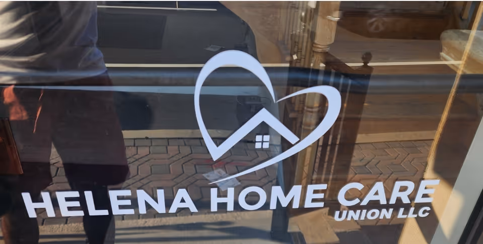 Glass door displaying Helena Home Care Union LLC logo with a heart-shaped house