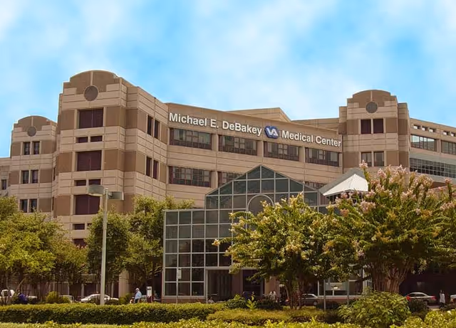 Exterior view of the Michael E. DeBakey VA Medical Center with glass atrium