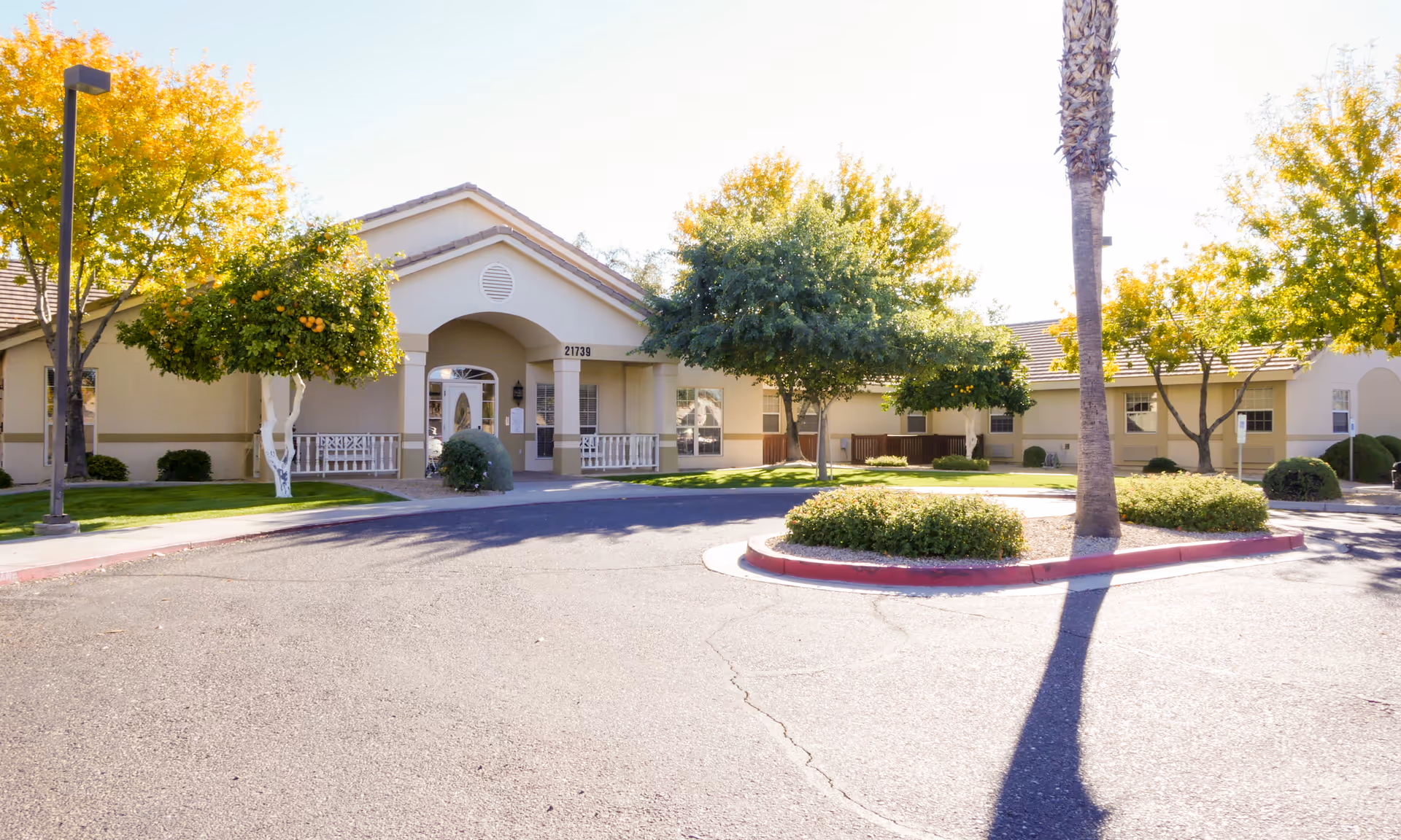 Exterior view of Brookdale Trail Ridge entrance with landscaped front drive