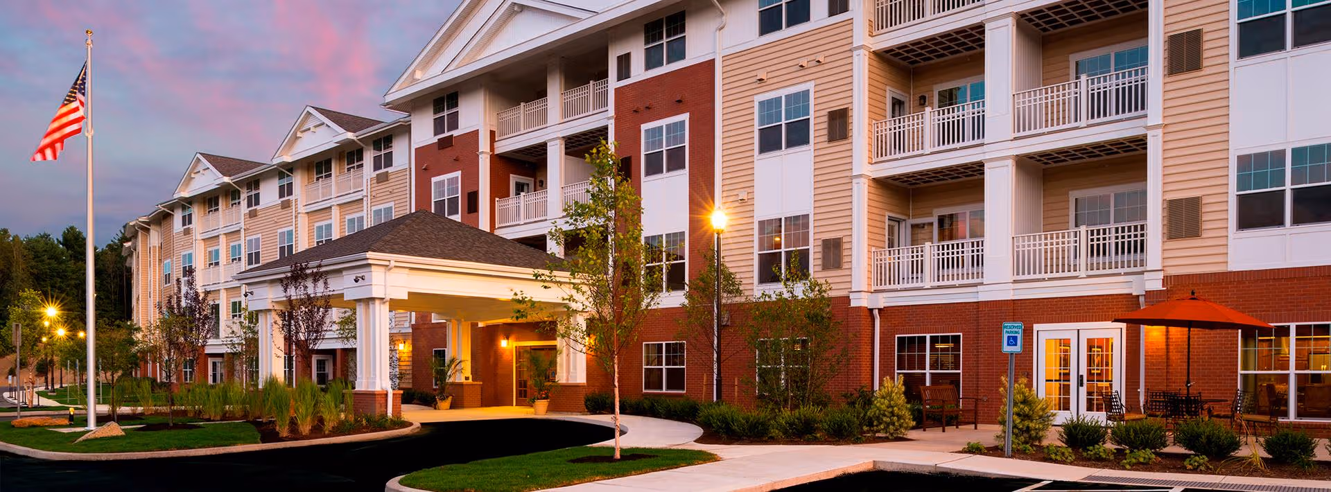 Exterior view of Brightview North Andover, a multi-story senior living building with balconies.
