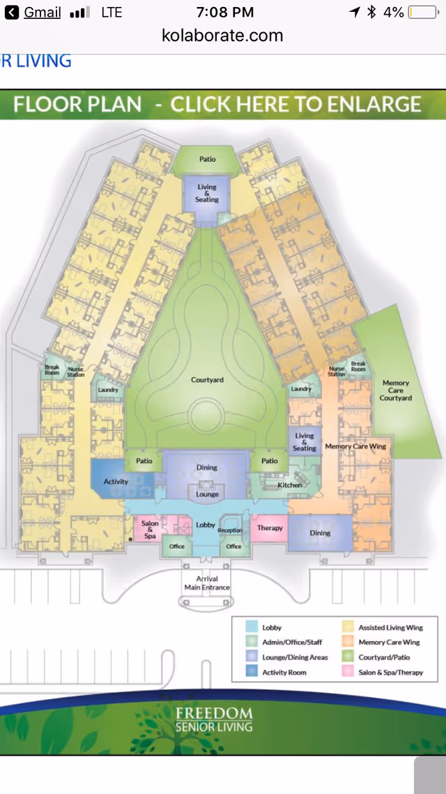Floor plan of Freedom Senior Living facility showing a central courtyard surrounded by assisted living and memory care wings, with labeled areas including lobby, dining, lounge, activity room, salon & spa, therapy, kitchen, nurse stations, break rooms, and patios.