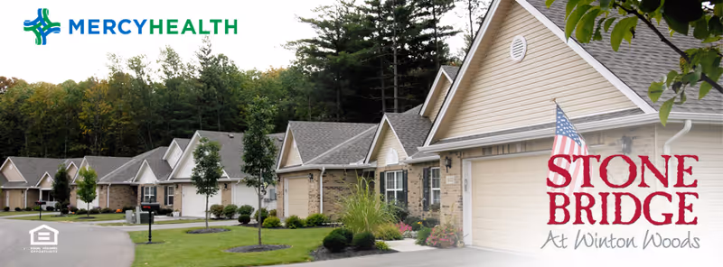 Mercy Health StoneBridge at Winton Woods exterior row of beige townhomes with landscaping.
