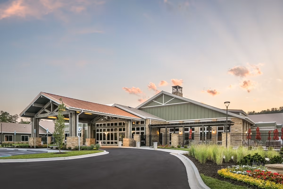 Exterior view of Tennessee State Veterans' Home Cleveland with covered entrance and landscaped grounds.
