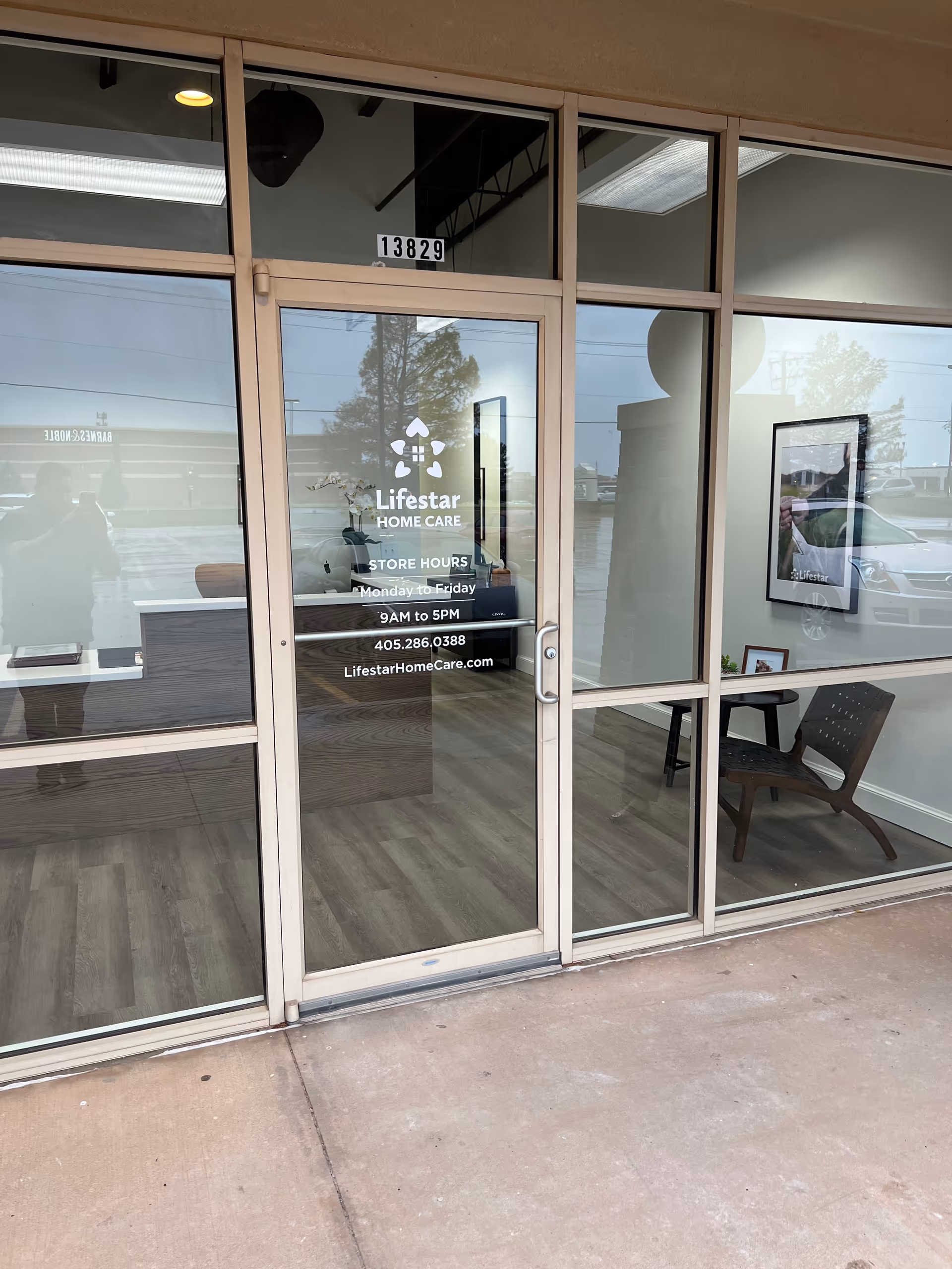 Glass storefront entrance displaying Lifestar Home Care sign and a waiting area.