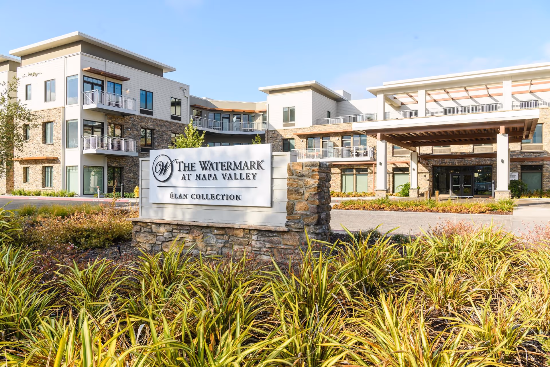 Exterior view of The Watermark at Napa Valley with sign and entrance canopy.