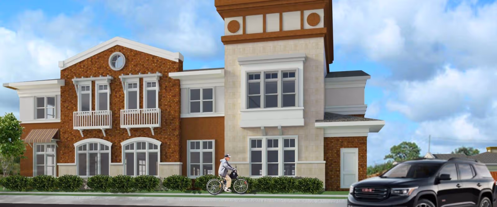 Exterior view of Twin Oaks Assisted Living facility with brick facade, cyclist, and car.
