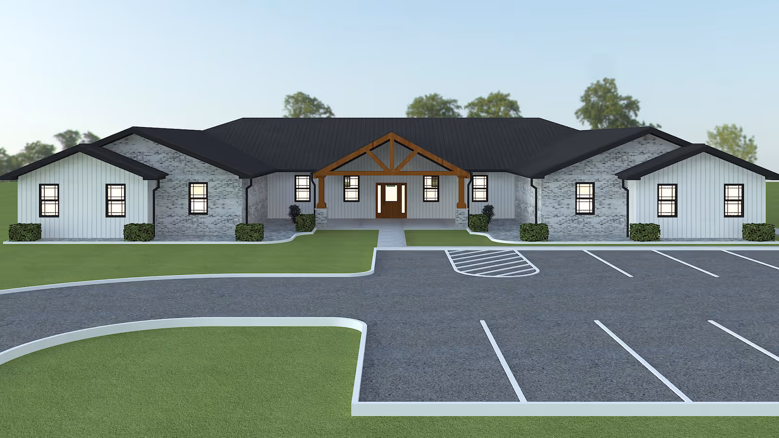 Front view of a single-story senior living facility with a covered entrance and parking lot.