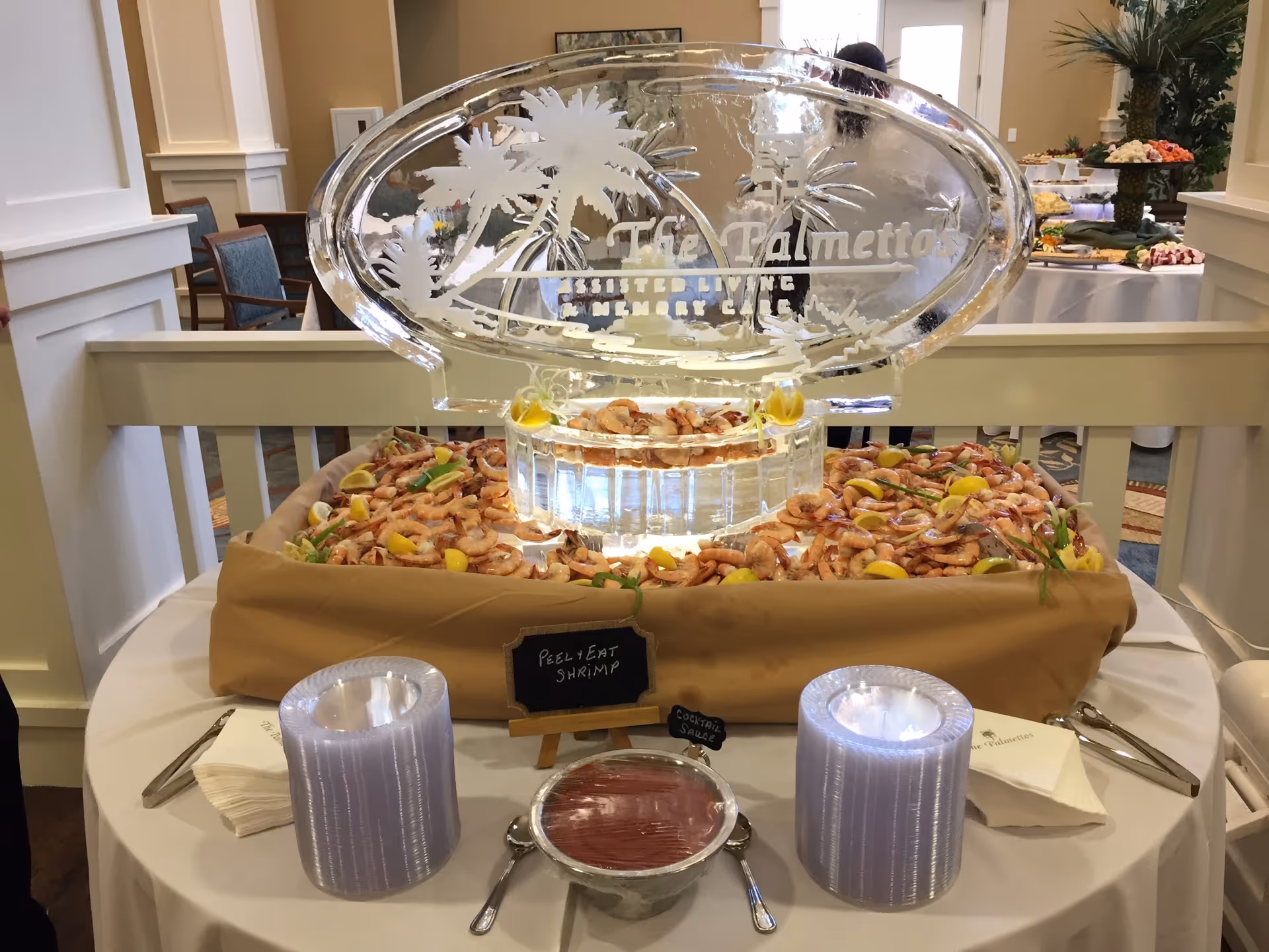 Buffet display of shrimp and salad on a table in Palmettos of Bluffton dining room.