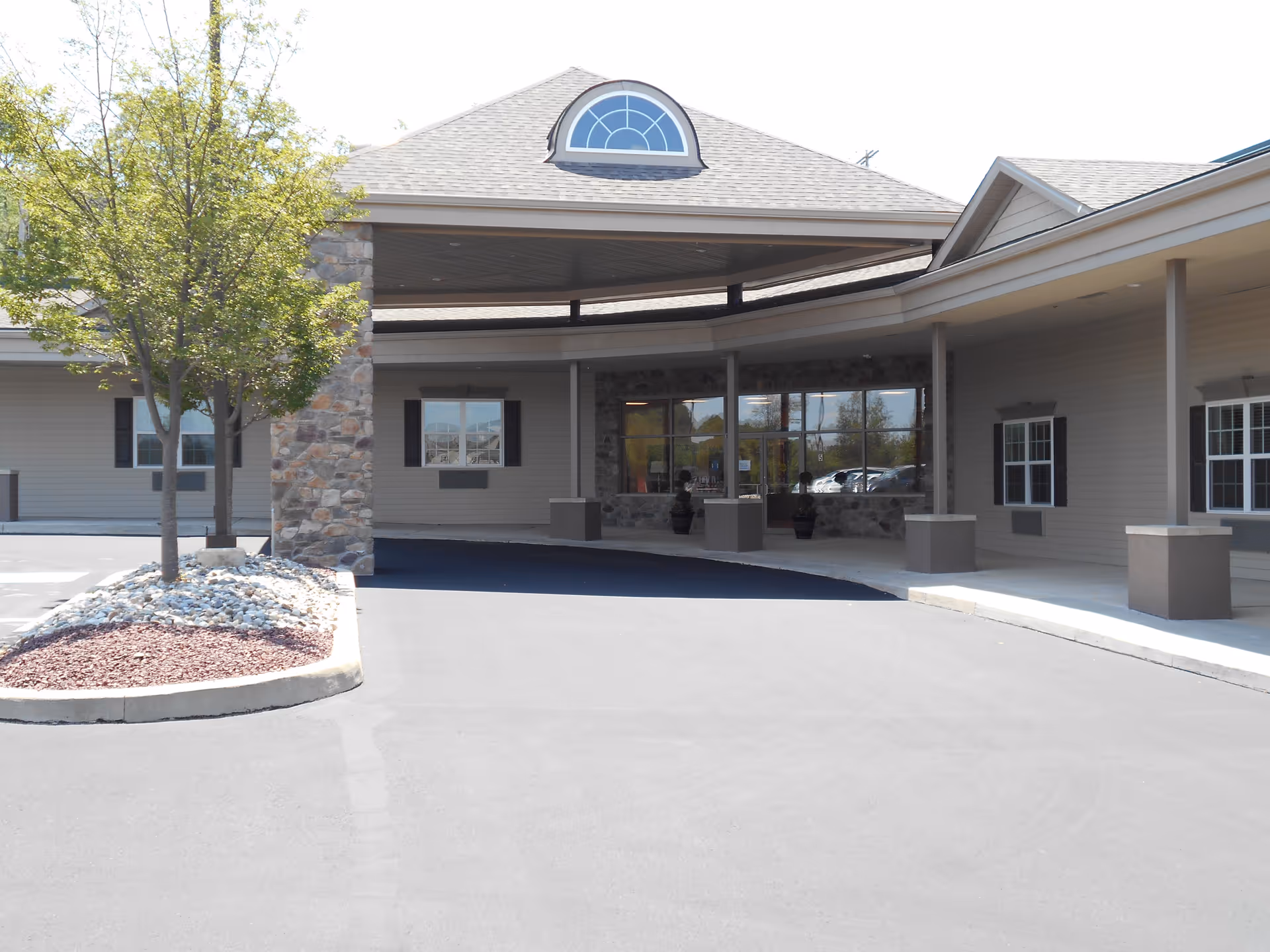 Exterior view of Abington Manor at Morgan Hill entrance with porte-cochère