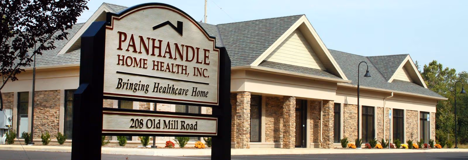 Exterior view of Panhandle Home Health, Inc. building with a large front sign.