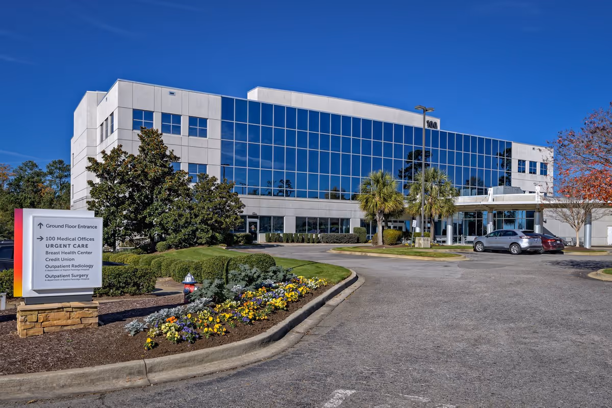 Exterior view of Prisma Health Endoscopy Center–Parkridge with glass facade and landscaped grounds.