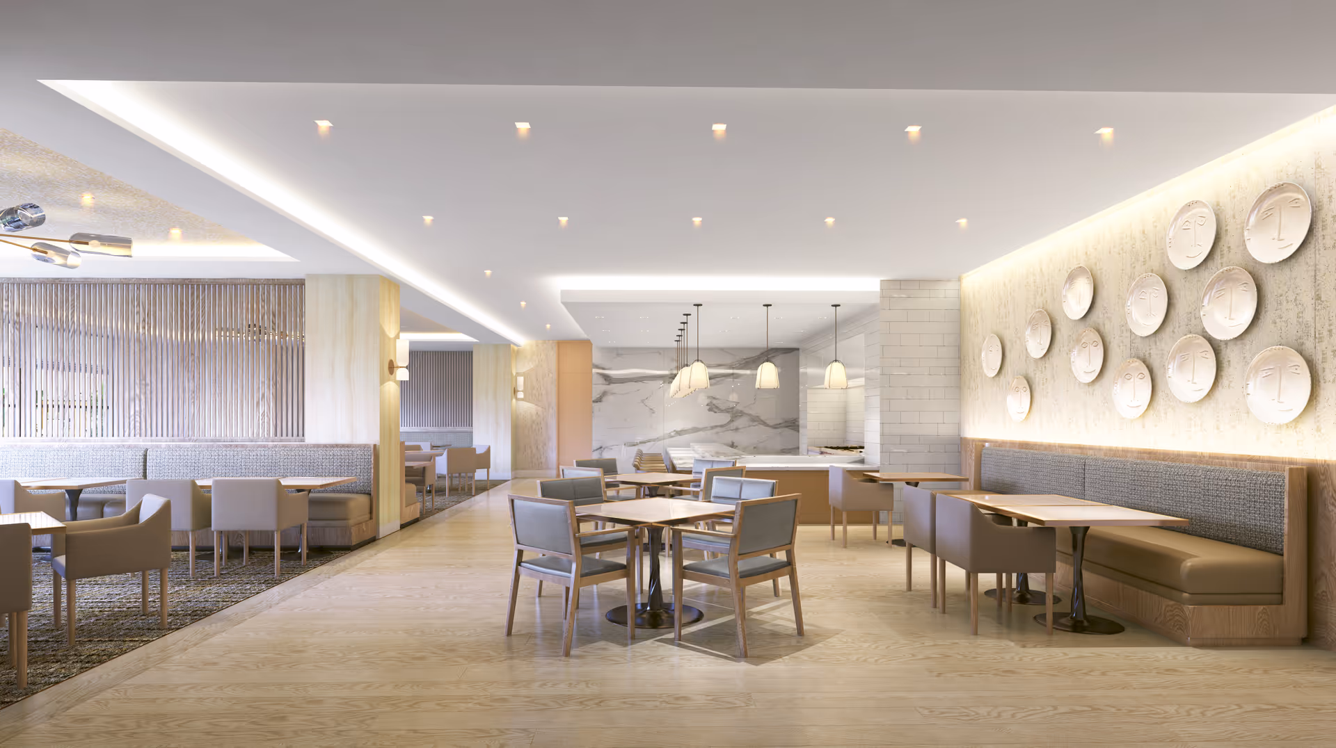 Spacious modern communal dining room with tables, chairs, booth seating and decorative wall plates on the right wall.