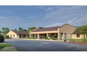 Front exterior view of Sherwood Healthcare Center with a covered entrance and parking.