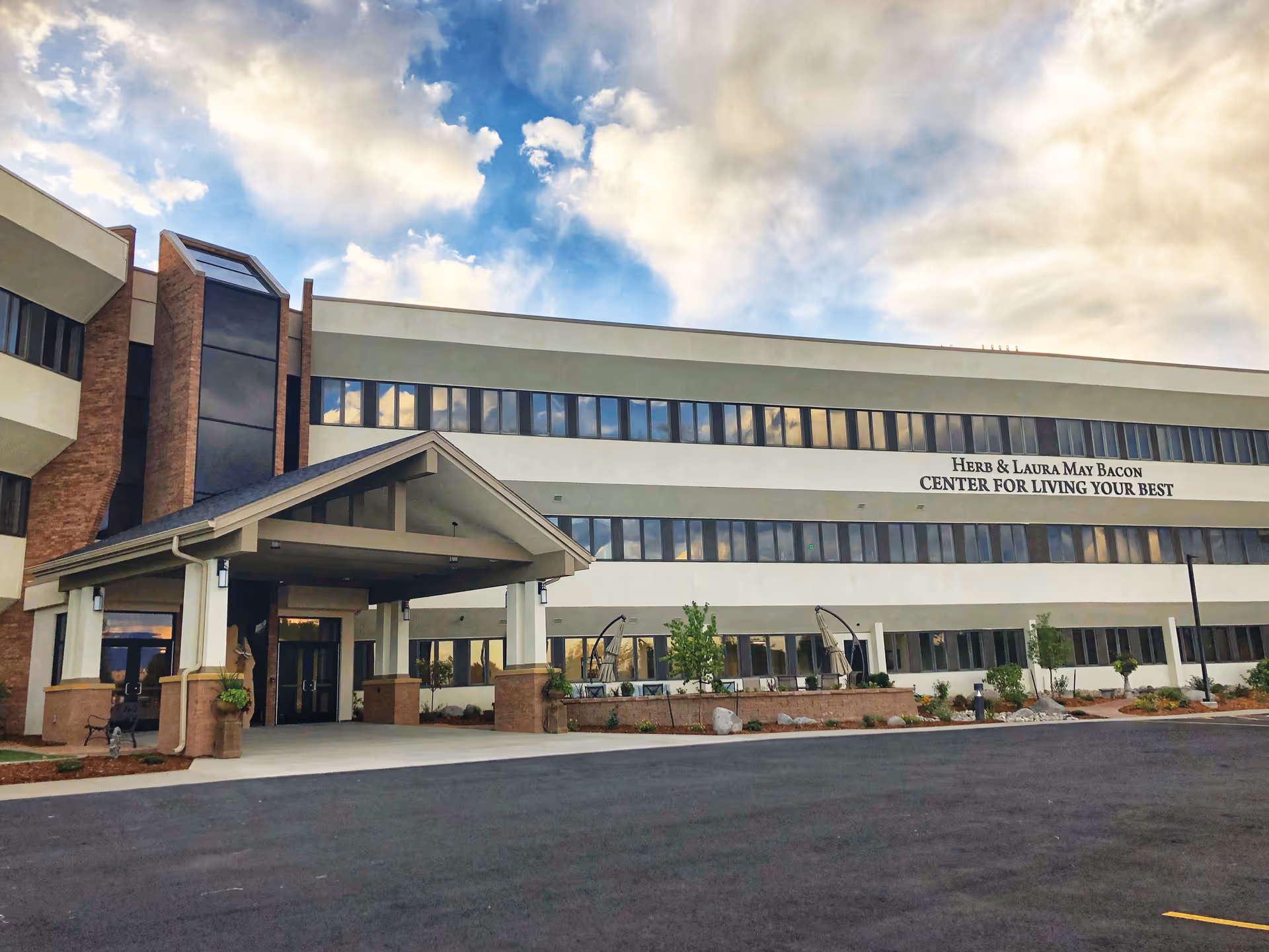 Exterior view of HopeWest Center for Living Your Best building with entrance canopy.