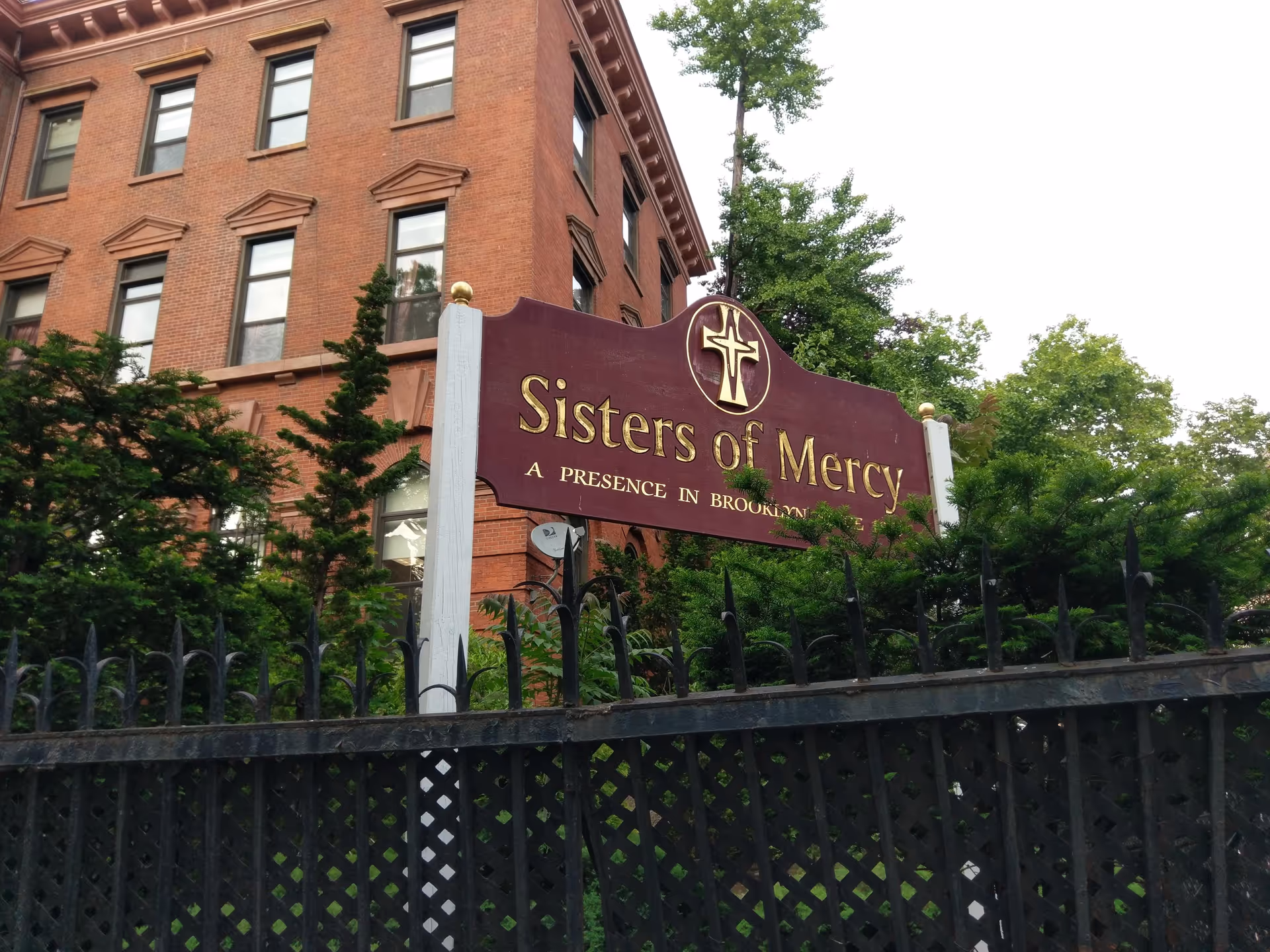 Brick building with a large Sisters of Mercy sign at the front.