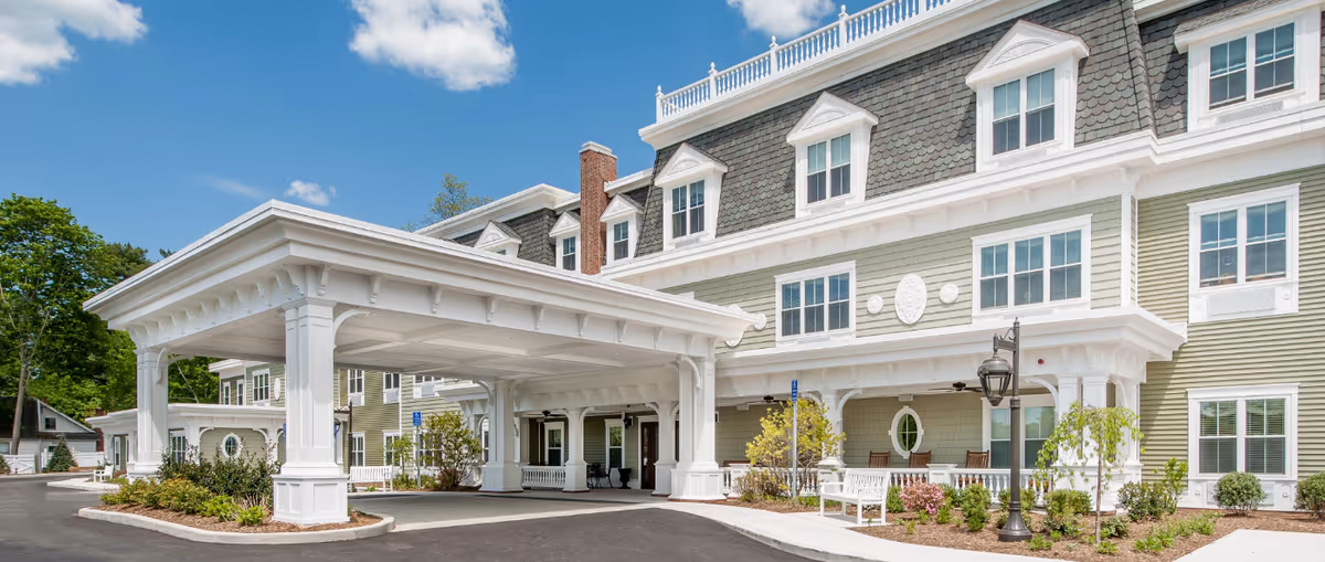 Exterior view of Brightview on New Canaan senior living with a covered entrance.