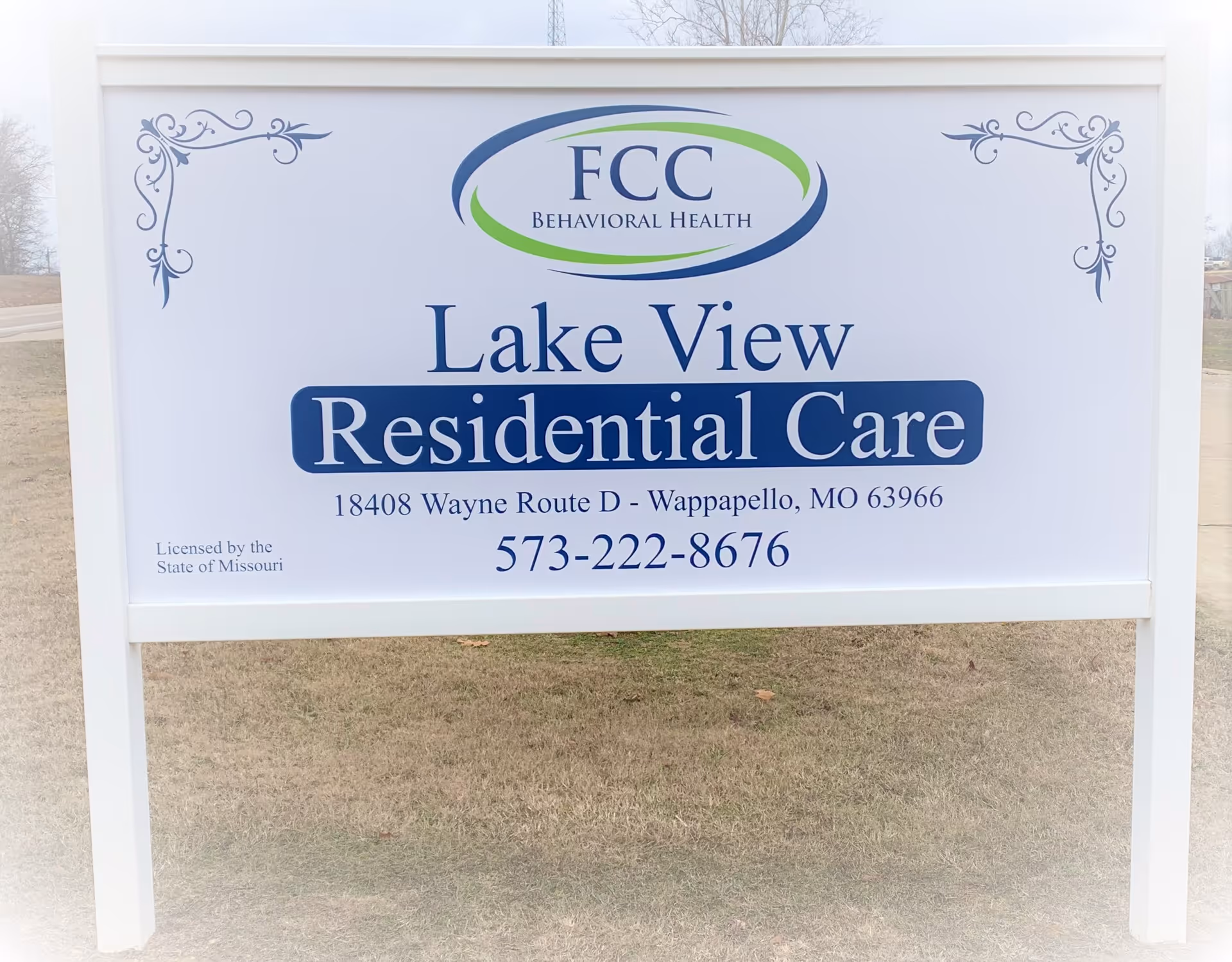 Outdoor sign for Lake View Residential Care with address and phone number.