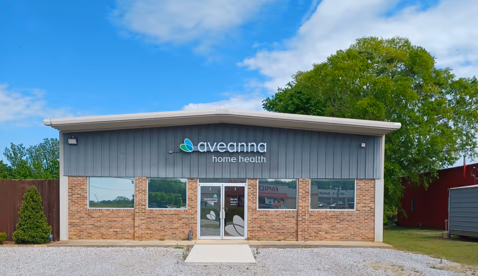 Brick storefront with Aveanna Home Health sign in Livingston, Alabama.