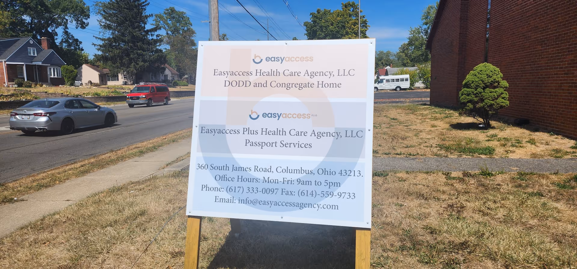 Outdoor roadside signboard for Easyaccess Health Care Agency on a grassy lawn
