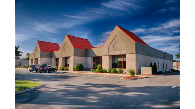 Front exterior view of Baystate Home Health in West Springfield, with a parking lot.