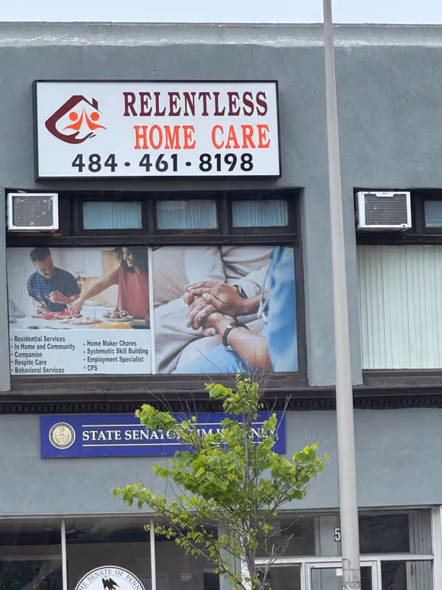 Exterior of a building with Relentless Home Care sign and storefront windows