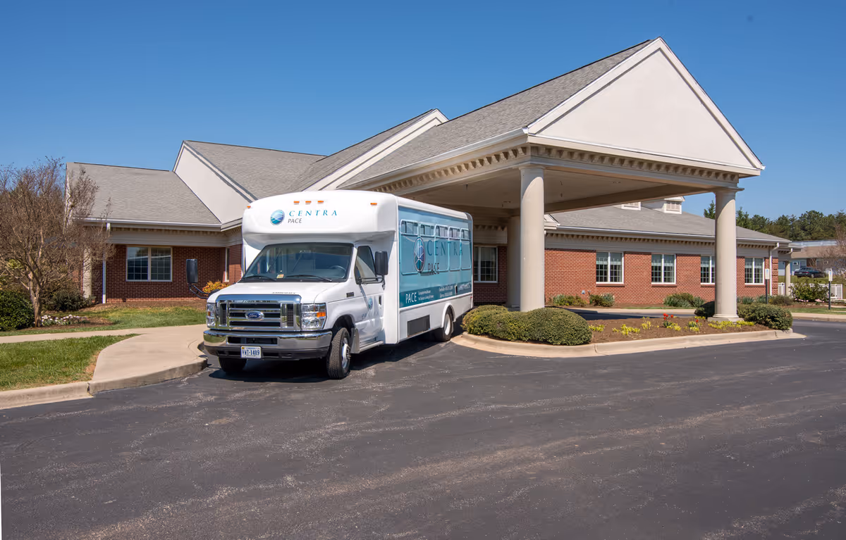 Front view of Centra PACE Gretna facility with a white van under a portico