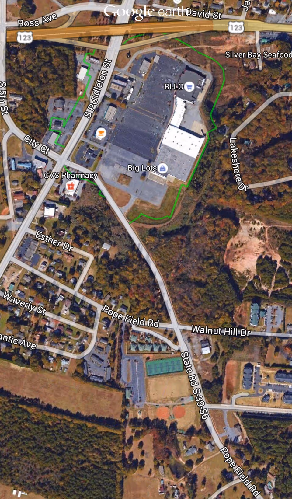 Aerial view of American Legion Senior Apartments complex from Google Earth, surrounded by roads.