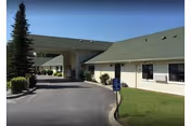 Exterior view of a Buena Vista Healthcare building with a driveway and entrance canopy.