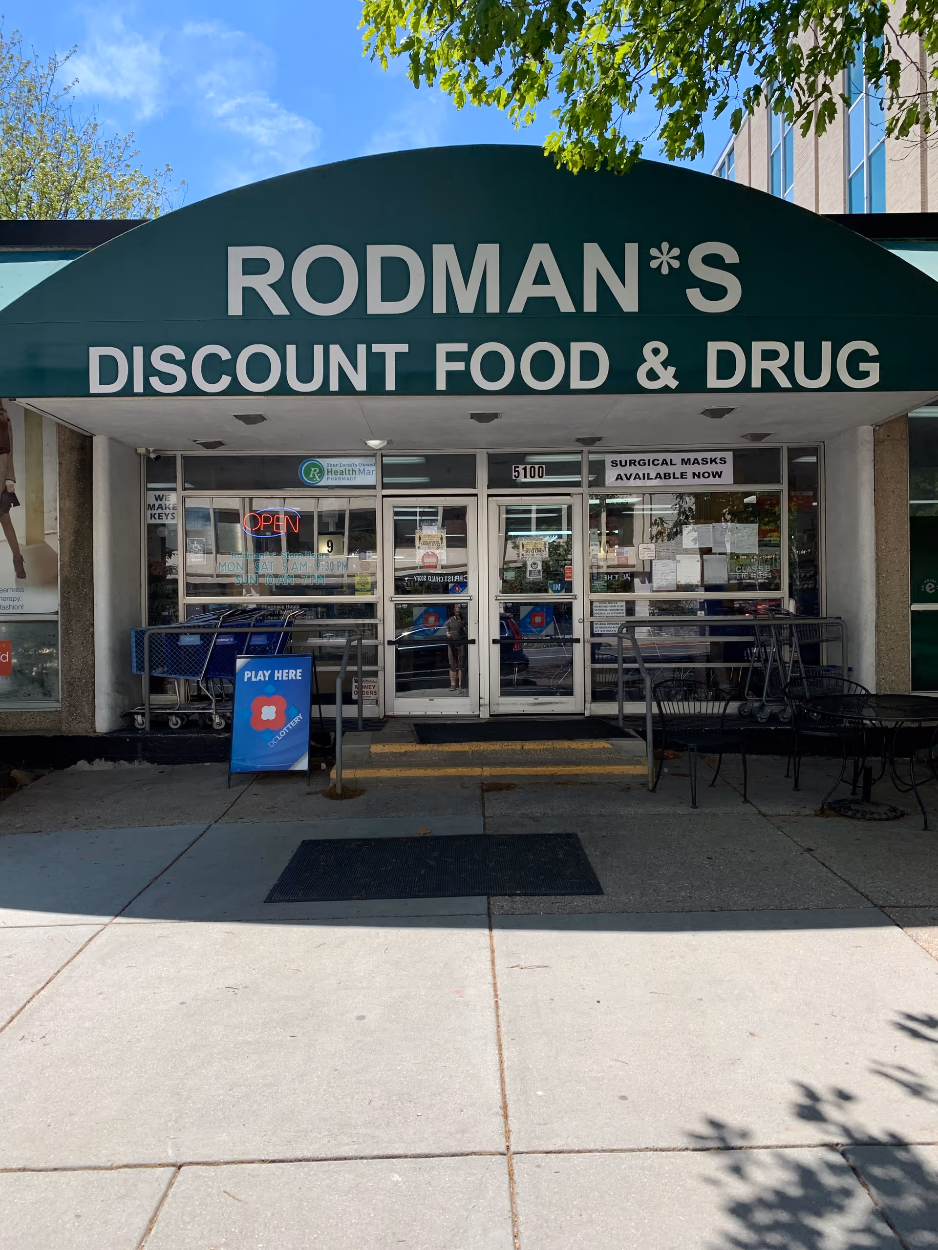 Front view of Rodman's Discount Food & Drug storefront with shopping carts