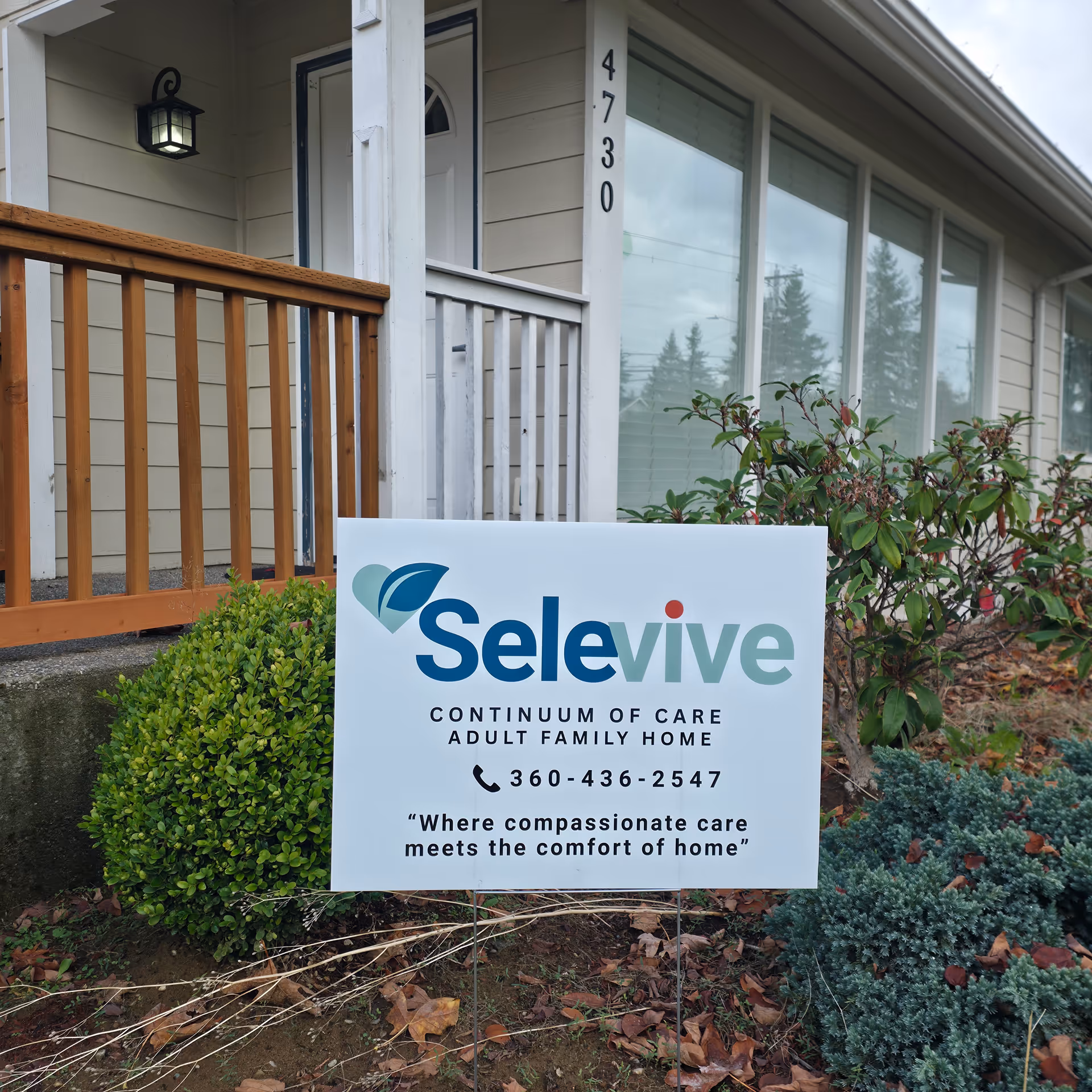 Front exterior of Selevive Continuum of Care Adult Family Home with sign