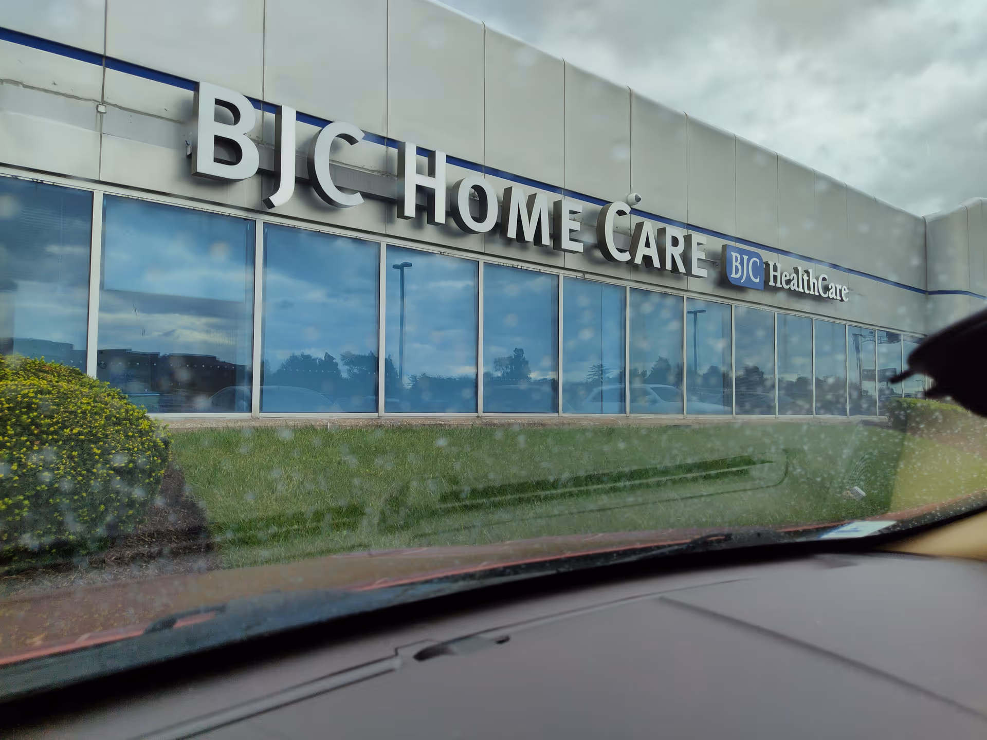 Exterior view of a BJC Home Care Services building with large windows.