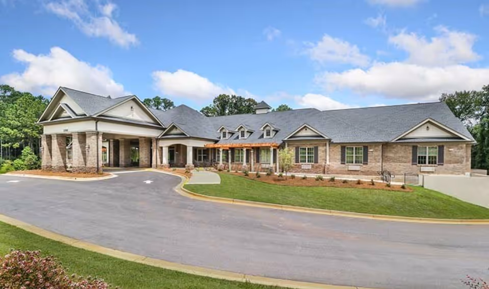Exterior view of Grace Senior Living of Sharpsburg, a brick-and-stone facility.