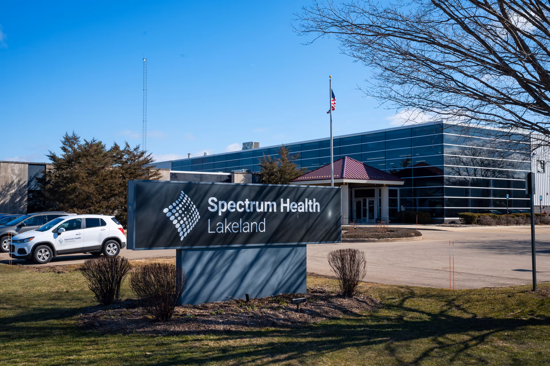 Exterior view of a medical facility with a Spectrum Health Lakeland sign.