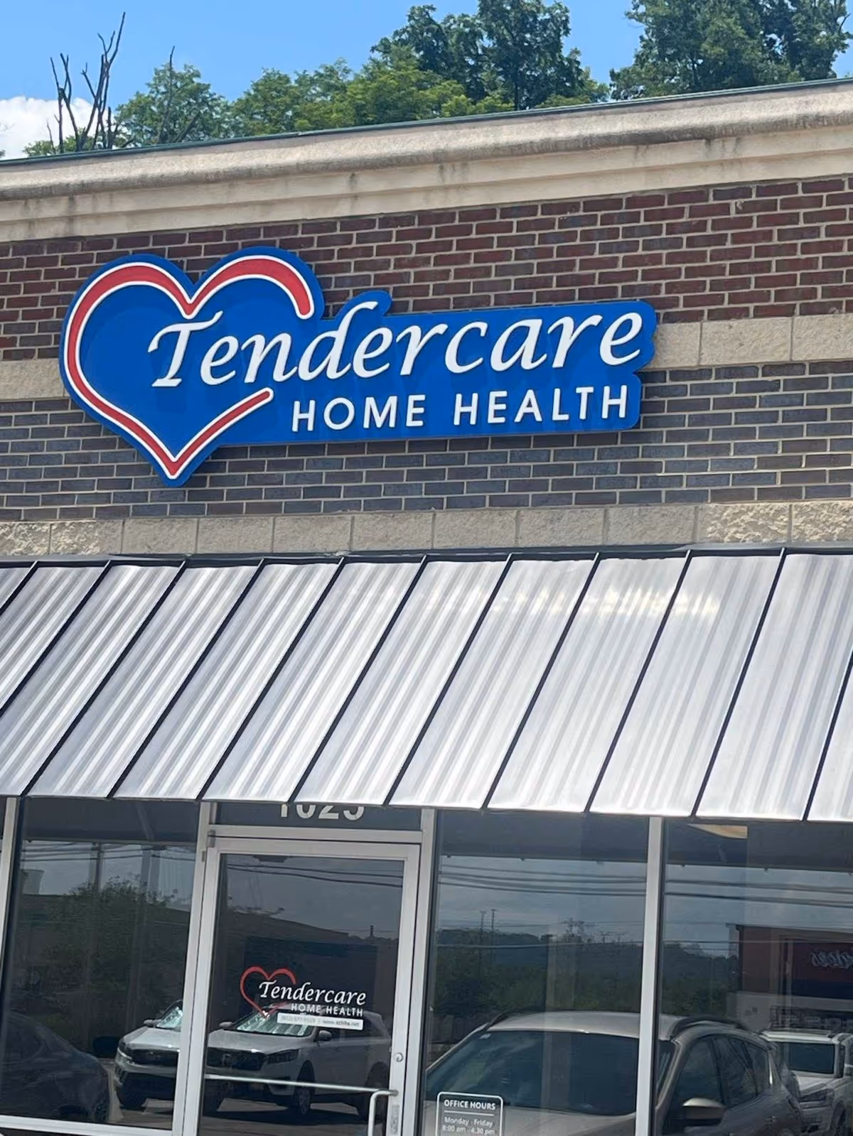 Exterior storefront of Tendercare Home Health with a blue heart logo sign.
